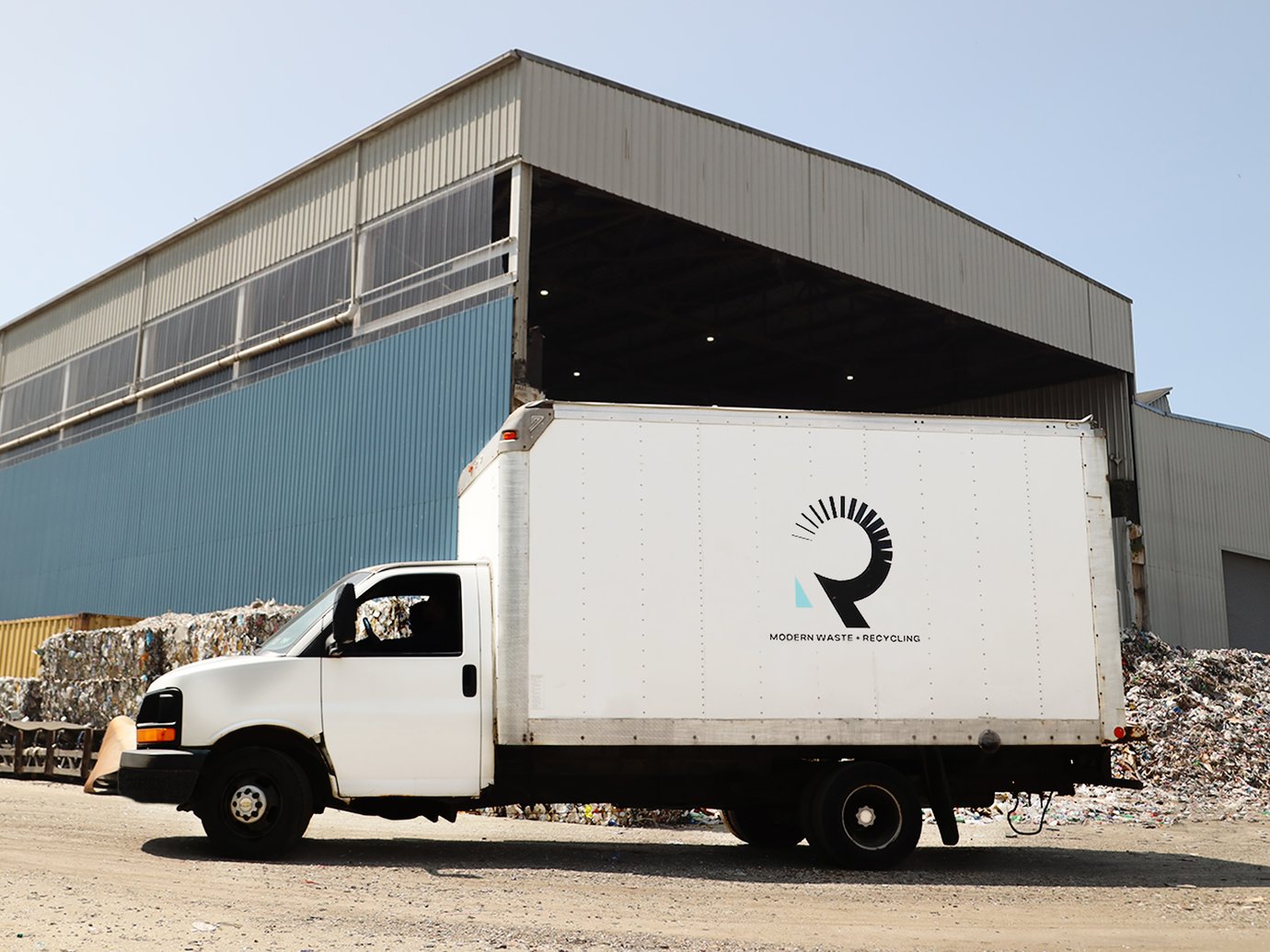 Box Truck in front of a recycling center