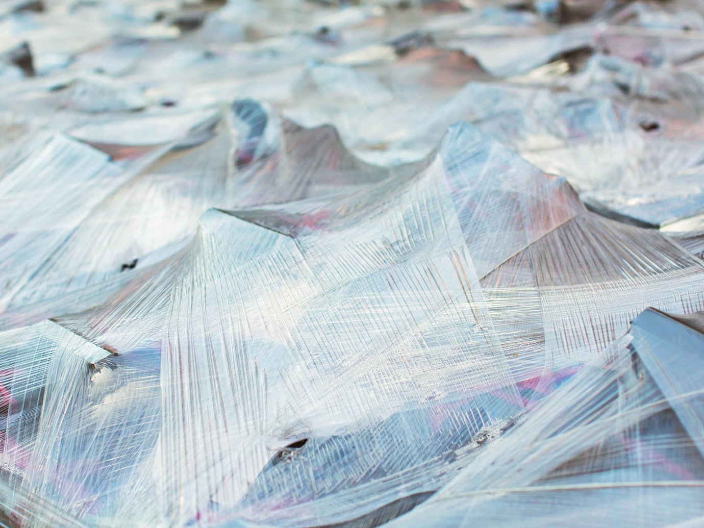 plastic wrapped pallets of various goods